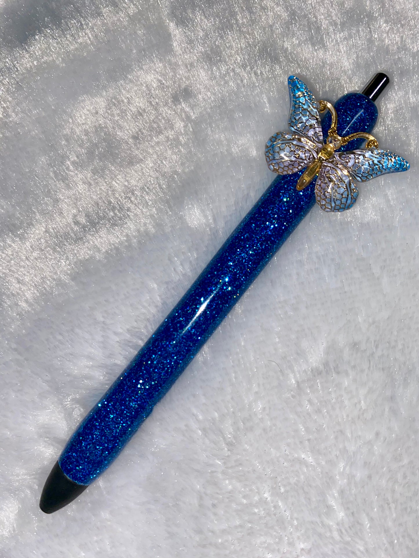 Gel Pen: Blue Glitter Pen with a gorgeous butterfly charm.