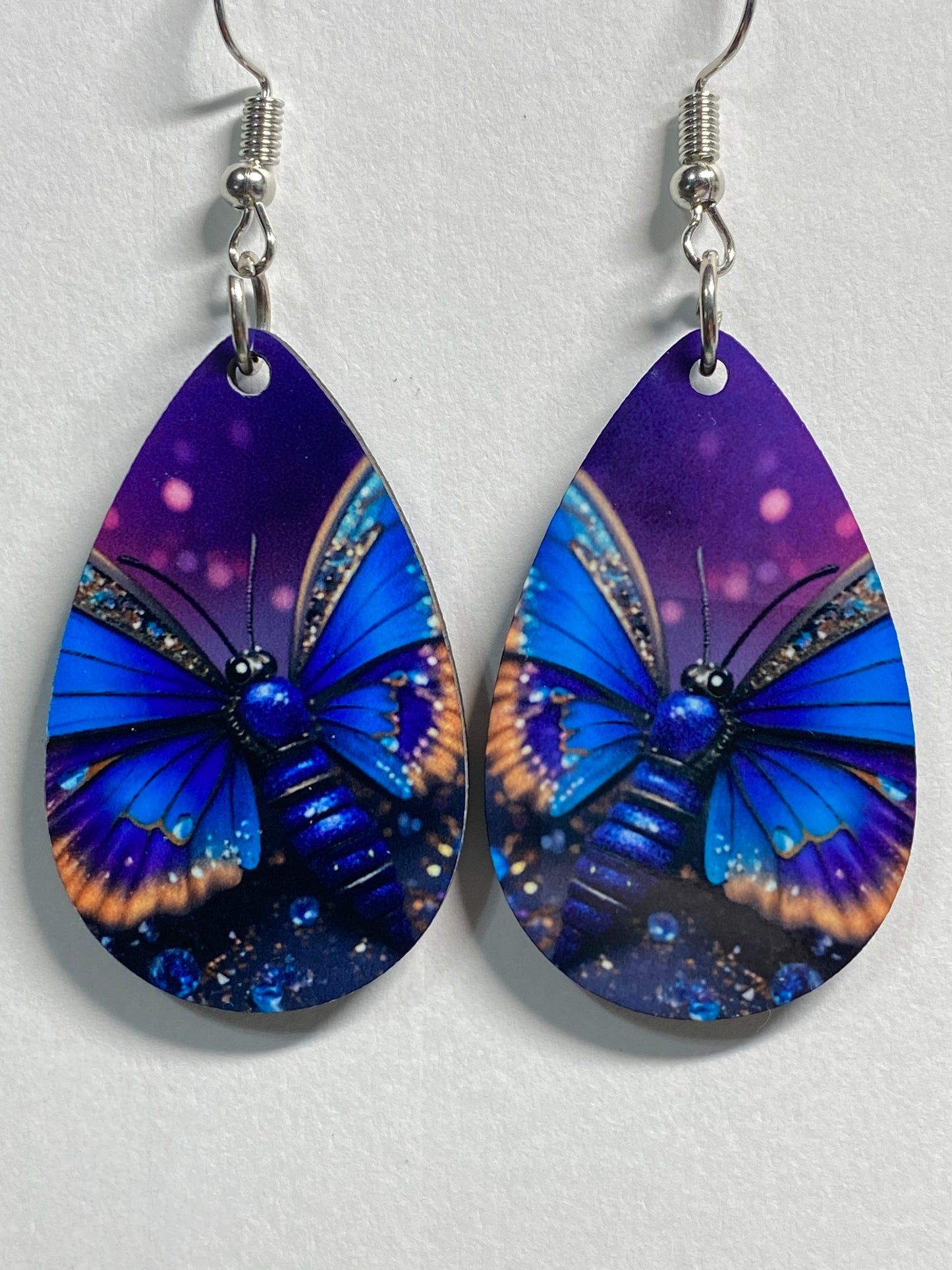 Wooden earrings: Blue Butterfly with Purple background