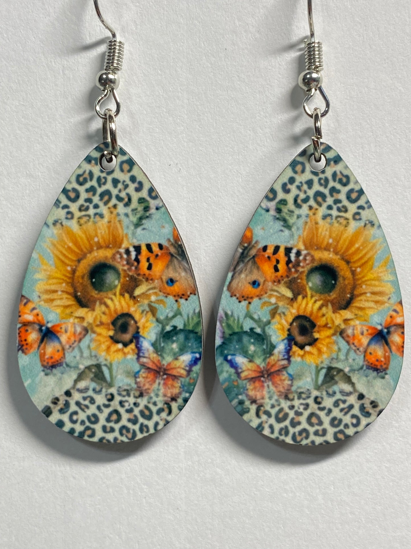 Wooden earrings: Sunflower and Butterflies on cheetah print.