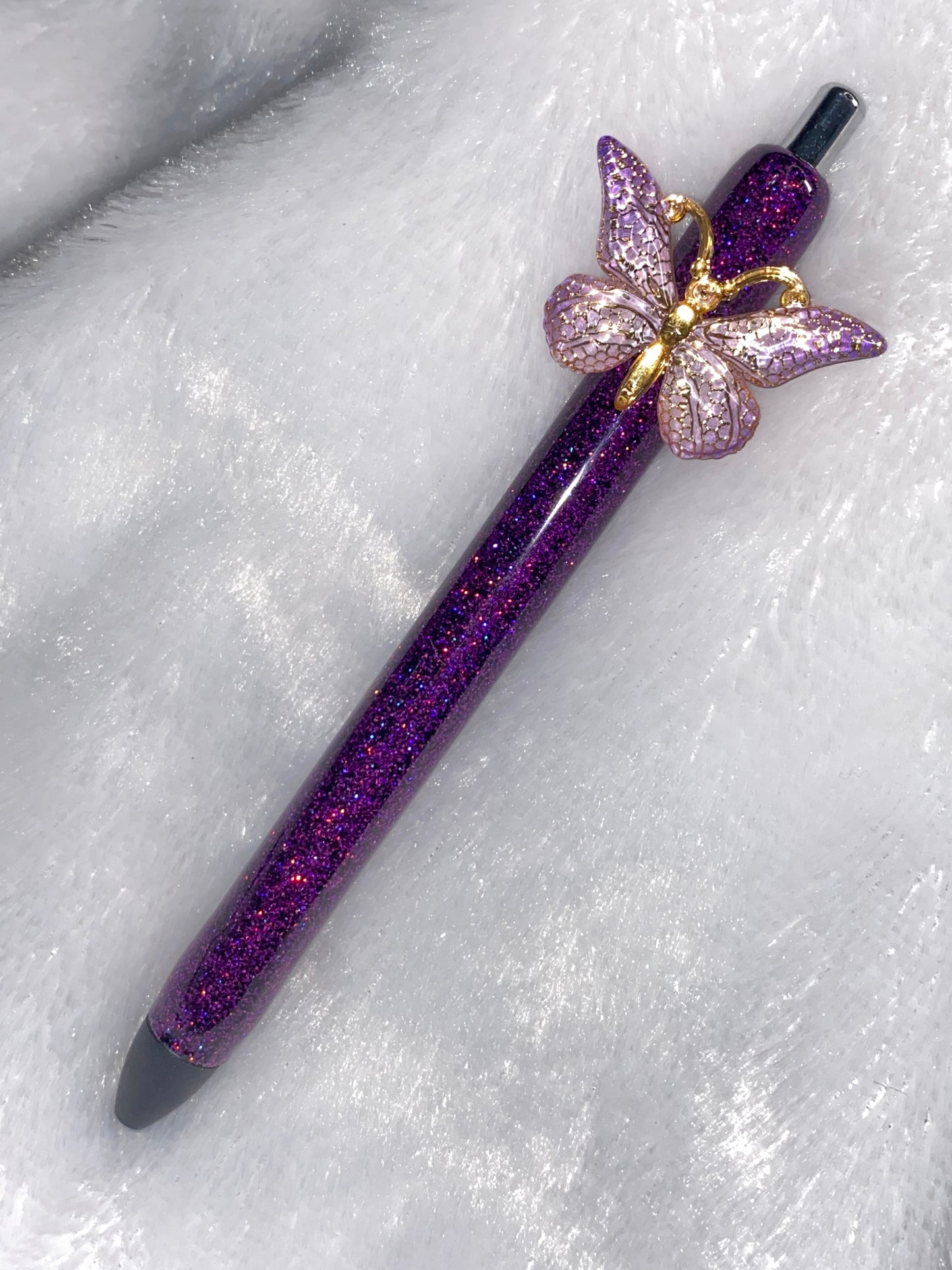 Gel Pen: Holographic Purple glitter with a gold and purple butterfly charm